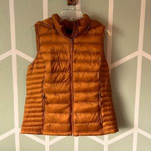 Copper colored vest with removable hood